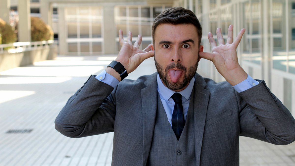 ALL THINGS ARE LAWFUL FOR ME::BUSINESSMAN MOCKING SOMEONE AT THE OFFICE © ajr_images | iStockPhoto.com