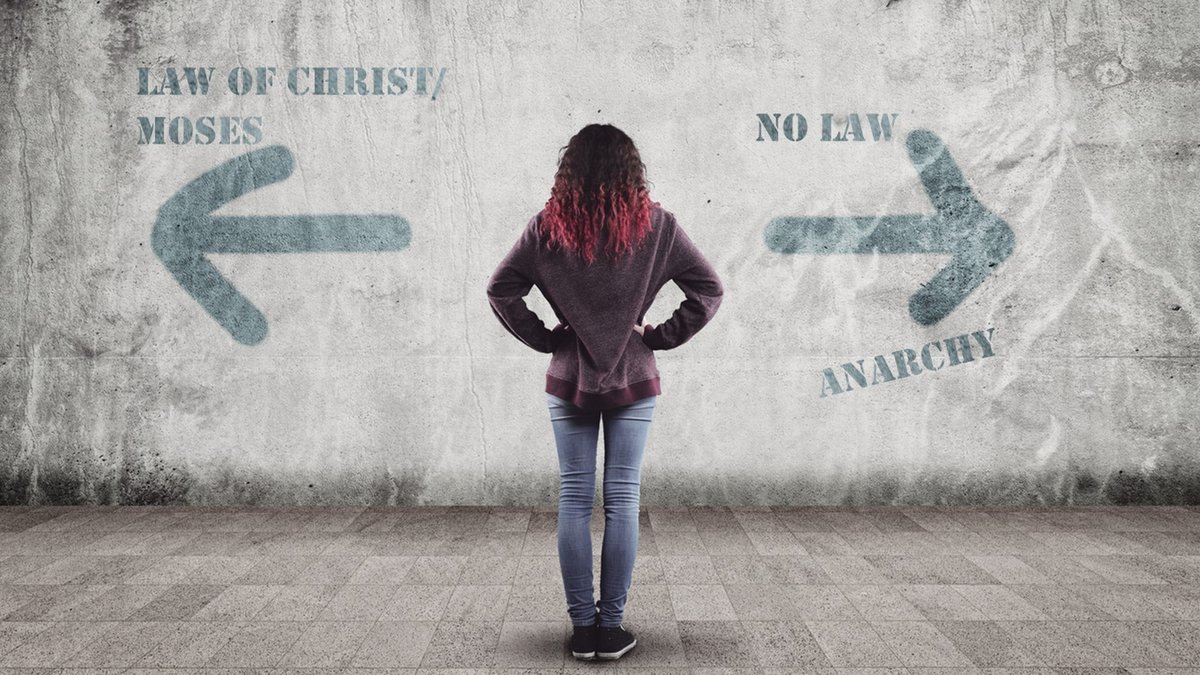 WE ARE UNDER THE LAW OF CHRIST NOT THE LAW OF MOSES::YOUNG GIRL AND ARROWS © ALLVISIONN | iStockPhoto.com