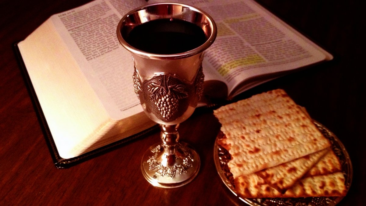 JESUS PROMOTED CANNIBALISM::LORD'S CUP AND BREAD AND BIBLE - John Snyder (2013) | Wikimedia.org