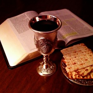 JESUS PROMOTED CANNIBALISM::LORD'S CUP AND BREAD AND BIBLE - John Snyder (2013) | Wikimedia.org