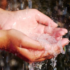 HANDS AND WATER © Elena Elisseeva | Dreamstime.com