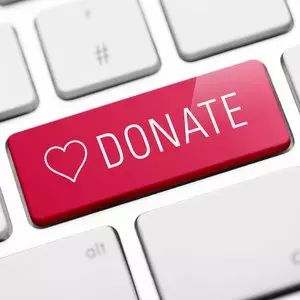 DONATE::ONLINE DONATE KEY ON KEYBOARD © pixelliebe | iStockPhoto.com