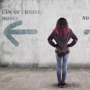 WE ARE UNDER THE LAW OF CHRIST NOT THE LAW OF MOSES::YOUNG GIRL AND ARROWS © ALLVISIONN | iStockPhoto.com