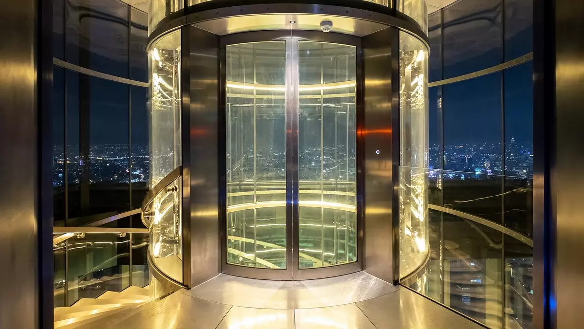 ELEVATED FROM SHEEP TO SACRIFICE::GLASS MODERN ELEVATOR © Panya7 | iStockPhoto.com