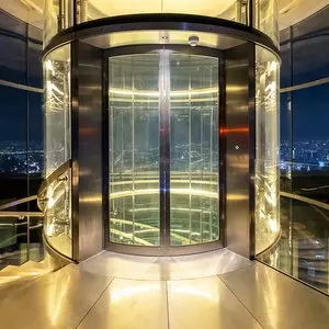 ELEVATED FROM SHEEP TO SACRIFICE::GLASS MODERN ELEVATOR © Panya7 | iStockPhoto.com