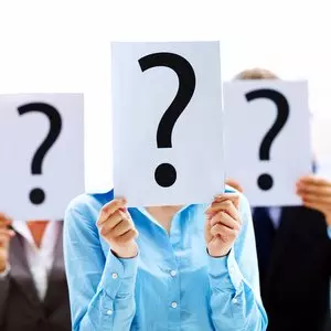 BUSINESS PEOPLE WITH QUESTION MARK © Yuri_arcurs | Dreamstime.com