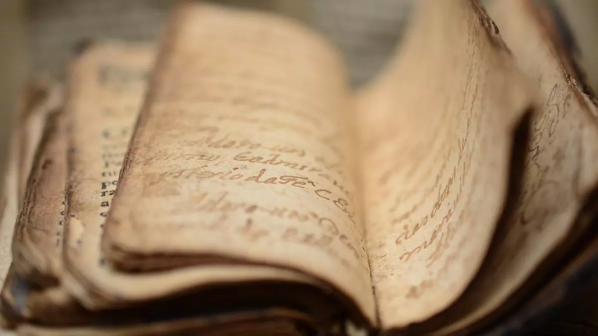 OLD MANUSCRIPT BOOK © BlackQuetzal | iStockPhoto.com