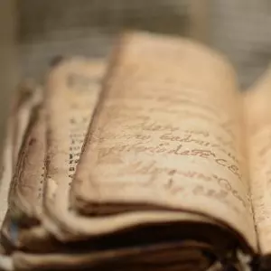 OLD MANUSCRIPT BOOK © BlackQuetzal | iStockPhoto.com